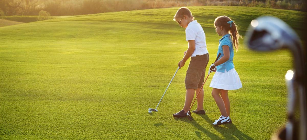 bigstock-Casual-Kids-At-A-Golf-Field-Ho-79961312